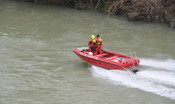 si-cerca-una-persona-portata-via-da-un-fiume-in-piena-a-parma