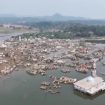 indonesia,-la-siccita-fa-riemergere-un-villaggio-sommerso-da-un-bacino-idrico